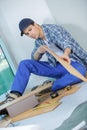 young handyman in uniform Royalty Free Stock Photo