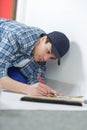 young handyman in uniform Royalty Free Stock Photo