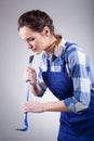Young handywoman with a jemmy Royalty Free Stock Photo