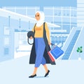 Happiness joyful shopaholic stylish fashionable hijab muslim woman at retail mall store carrying shopping bags