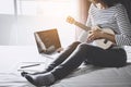 Young happiness woman on bedroom in enjoying playing the music w