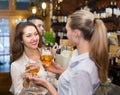 Young happy adults at bar