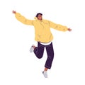 Young happy african american man in yellow sweater and black jeans fun jumps and laughs cheerfully Royalty Free Stock Photo