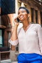 Young Happy African American Woman with short afro hair, traveling in New York City Royalty Free Stock Photo