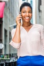 Young Happy African American Woman with short afro hair, traveling in New York City Royalty Free Stock Photo