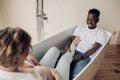 Young happy african man and caucasian pregnant woman take a bath Royalty Free Stock Photo