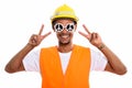 Young happy African man construction worker smiling while wearin Royalty Free Stock Photo