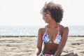 Young happy afro american woman on beach looking away Royalty Free Stock Photo