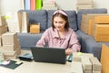 Young happy asian online business woman working on her computer Royalty Free Stock Photo