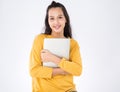 Young happy Asian student woman holding laptop on white background. Royalty Free Stock Photo