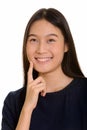 Young happy Asian teenage girl smiling and thinking Royalty Free Stock Photo