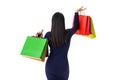 Young happy Asian woman holding shopping bags with smiley face isolated on white Royalty Free Stock Photo