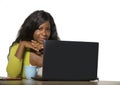 Young happy and attractive black Afro American business woman smiling cheerful and confident working at office computer desk relax Royalty Free Stock Photo
