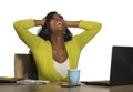 Young happy and attractive black afro American business woman smiling cheerful and confident working at office computer desk celeb