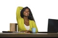 Young happy and attractive black Afro American business woman smiling cheerful and confident working at office computer desk relax Royalty Free Stock Photo