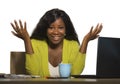 Young happy and attractive black Afro American business woman smiling cheerful and confident working at office computer desk relax Royalty Free Stock Photo