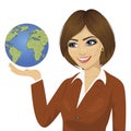 Young happy attractive brunette businesswoman holding the globe