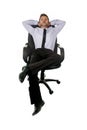 Young happy attractive businessman leaning relaxed sitting on office chair isolated on white Royalty Free Stock Photo