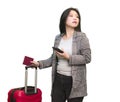 Young happy and beautiful Asian Korean woman carrying suitcase holding passport and mobile phone ready for holidays trip smiling Royalty Free Stock Photo