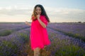 Young happy and beautiful Asian Korean woman in Summer dress enjoying nature running free and playful outdoors at purple lavender Royalty Free Stock Photo