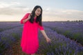 Young happy and beautiful Asian Korean woman in Summer dress enjoying nature running free and playful outdoors at purple lavender Royalty Free Stock Photo