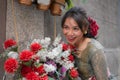 Young happy and beautiful Indonesian woman in traditional Baline