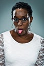 Young Happy Black Woman Sticking Out Her Tongue Royalty Free Stock Photo