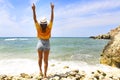 Young happy blond woman at beautiful tropical paradise view of ocean enjoying summer holidays Royalty Free Stock Photo