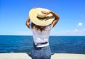 Young happy blond woman at beautiful tropical paradise view of ocean enjoying summer holidays Royalty Free Stock Photo