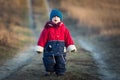 Young happy boy playing outdoor on country road Royalty Free Stock Photo