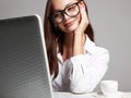 Young Happy Business Woman In Office. Beautiful Girl In Glasses