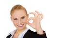 Young happy business woman shows OK sign Royalty Free Stock Photo