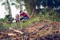 Young camping couple cooking meal