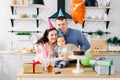 Young happy Caucasian family celebrating a first birthday party of their little baby boy Royalty Free Stock Photo