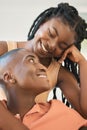 Young happy cheerful african american couple bonding and enjoying relaxing time together at home. Loving black female Royalty Free Stock Photo
