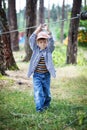 Young happy child boy in adventure park. Royalty Free Stock Photo