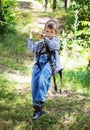 Young happy child boy in adventure park. Royalty Free Stock Photo