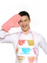 Young happy cook man in apron smiling