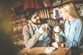 Young happy couple at cafe. Royalty Free Stock Photo