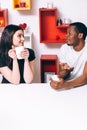 Young happy couple drink tea on kitchen, leisure