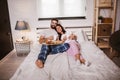 Happy couple drinking coffee in bed at morning Royalty Free Stock Photo