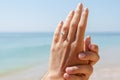 Young Happy Couple Is Getting Engaged In Wedding Proposal On Beach Royalty Free Stock Photo