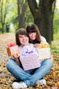 Young happy couple with gift boxes Royalty Free Stock Photo