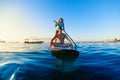 Young happy couple have fun on stand up paddleboard Royalty Free Stock Photo