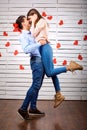 Young happy couple with heart in hands onbackground Royalty Free Stock Photo