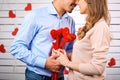 Young happy couple with heart in hands onbackground Royalty Free Stock Photo