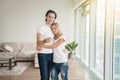 Young happy couple, holding a key Royalty Free Stock Photo