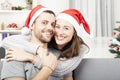 Young happy couple hug and love christmas