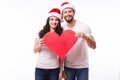 Young Happy Couple hugging and big red heart Royalty Free Stock Photo