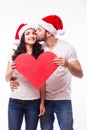 Young Happy Couple hugging and big red heart Royalty Free Stock Photo